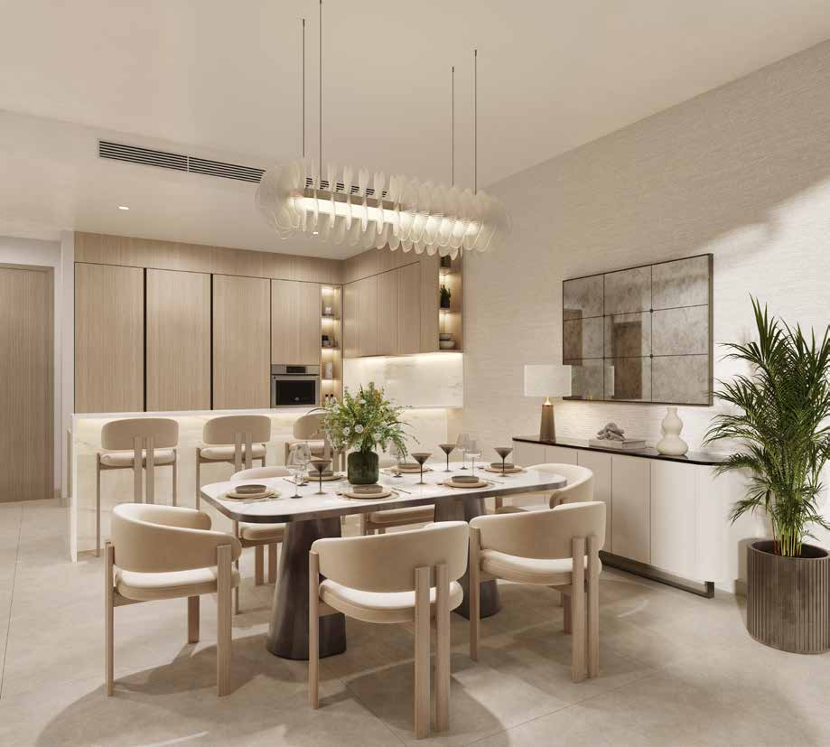 Dining table beside a wood-panelled kitchen with breakfast bar