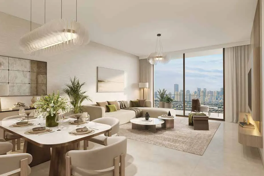 Bedroom with full-height windows and a reading chair overlooking the city