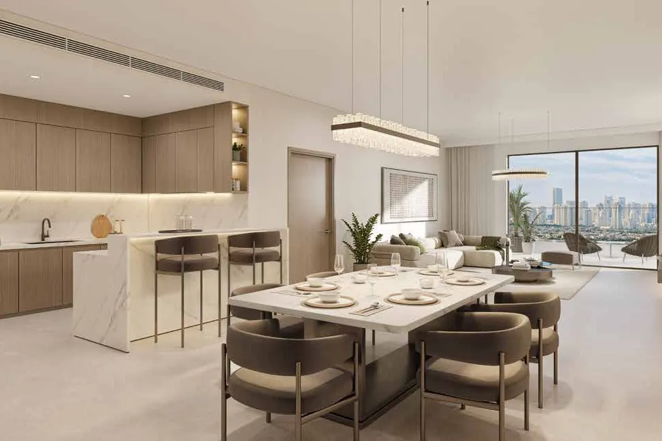Two-bedroom dining and living area with wide windows onto a terrace