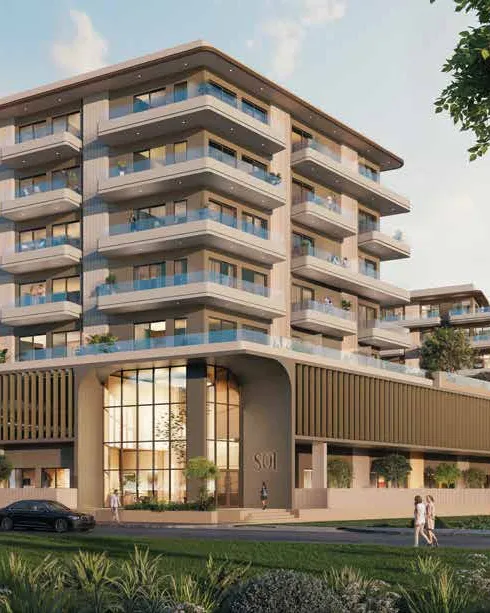 Sol Terra Gardens exterior with glazed entrance, balconies and tree-lined street