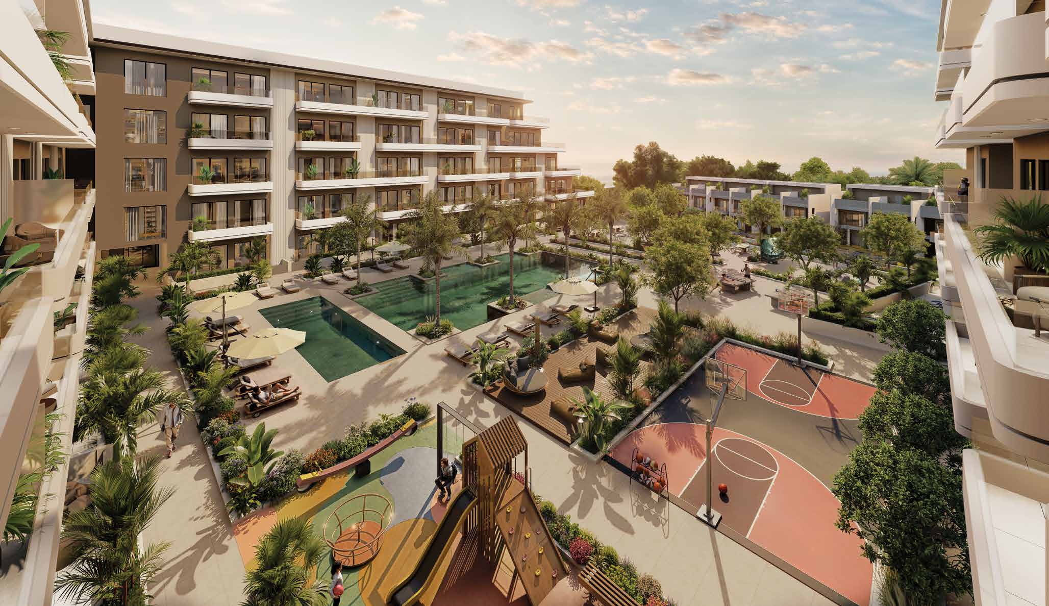 Courtyard with pools, sun loungers, basketball court and children's playground